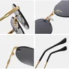 12% rabatt på grossist av solglasögon Frameless Gold Metal Ladies Solglasögon Rimless Gradient Lens Blue Fashion Sun Glasses For Men UV400 Summer