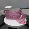 Stylisheendibags Messenger väskor Designer Balansiagas Kvinnor doftande vind kvinnors lilla gyllene bollkedja het mamma väska koreansk version en axel 25x15 rosa