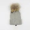 Designer Winter malha de malha chapéu de lã mulher malha grossa grossa quente pêlo de pele pom chapéus fêmeas gorro de gorro feminino