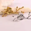 Towel Rings 4PCS Plum Blossom Metal Napkin Christmas Gold Color Buckles Holder for Home Dinning Room el Table Decor 230627