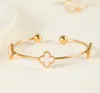 Van Clover Bracelet Designer Jewelry Bracelet Women 18K Gold Plated All Crystal Clover Flower Cuff قابل للتعديل