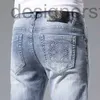 Mäns jeans designer designer 2023 nya jeans mäns smala byxor med små fötter hål broderade präglade tunn sommar mrm8 1a90
