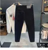 Jeans da uomo firmati Pure Black Cotton Autunno 2022 New Slim Fit Feet Elastic High End European Small Straight Pants SPOH MXD3