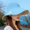 Bérets 2023 Little Daisy Fisherman Hat La marque de mode pour femmes Le pare-soleil double face peut être pris comme substitut pour l'été Thin Sunscre