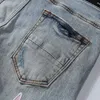 Mäns jeans designer designer split denim byxor mens smala fit casual hip hop -knappbyxa pant män elastiska kvinnors hål smala lila jean true 6avr