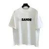 Eur Designer moda clássico jil sander camisa casual mens mulheres carta impressão casais camiseta estilo simples solto manga curta oversized camiseta