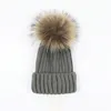 Designer Winter malha de malha chapéu de lã mulher malha grossa grossa quente pêlo de pele pom chapéus fêmeas gorro de gorro feminino