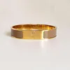 Bracelete de ouro clássico esmaltado de 12 mm de largura Pulseiras de aço de titânio com design de marca de luxo para joias masculinas e femininas (versão baixa)