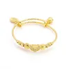 Jxx 24K bijoux en or vente chaude push and pull bijoux remplis d'or bracelets et bracelets femmes charme cloche bracelet avec perles