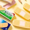 Eraser 30 PCS / Lot Creative Bandaid Eraser Mignon d'écriture Drawing Rubber Crayer Erasers PAPELERI