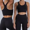 Europeiska och amerikanska heta tätt Push Up Beauty Back Opering Bh Curve Hip Rain High Midj naken Feel Yoga Pants Suit