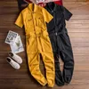 Herrbyxor män män overaller kort ärm multi-pocket designer chic jumpsuit mode streetwear casual last lös svart frakt