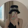 Chapeau de paille teint à l'encre femmes 2022 printemps et été nouveau parasol crème solaire pêcheur casquette dames élégantes bord de mer vacances seau chapeaux