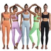 Soutien-gorge de sport de conception creuse de couleur unie ajustée européenne et américaine taille haute Nude Feel Fitness Pantalon Yoga Suit