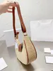 Designer Luxe Raffia's grote reis onderarm tas dames celiny koppeling tas handtassen strand schouderstad make -uptassen mannen strik wever driehoek crossbody shopper tas