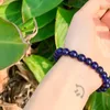 Strand lapis lazuli runda pärlstav armband högkvalitativa naturstenpärlor armband helande kristaller elastiska smycken gåva