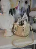 Designer Bag Alphabet Ribbon borsa intrecciata a mano All-in-one semicerchio super Fairy grass borsa intrecciata Borsa da spiaggia per foto al mare da donna qwertyui879