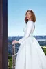 Pure White Satin A Line Wedding Dresses V Neck Long Sleeve Pleat Brudklänning Puffy kjol Castle Bröllopsklänningar med Belt Vestidos de Novia