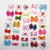 Accessoires 20/50 / 100pcs / Set Chien Hair Fleur Fleur Pet Coie de chien Affaire des cheveux Pet Accessoires Accessoires Chiens Bands Élastiques