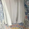 Conjunto de vestidos de duas peças com estampa azul vintage de verão, gola redonda, design estampado, camiseta de manga curta, cintura alta, mistura e combinação de padrões, saia plissada, saias de grife