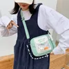 Sac en toile Sac de messager féminin Ins Style Style japonais Étudiants frais du primaire et du secondaire Sac à bandoulière mignon Transparent Jelly Pac