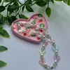 Breloques couleur papillon perle chaîne de téléphone portable pour les femmes dessin animé mignon perlé étui breloque téléphone Anti-perte lanière bijoux cadeau