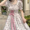Elegant blommig klänning kvinnor snörning koreansk prinsessa fairy sweet midi klänning bandage chic designer puff hylsa casual klänning sommar 220526