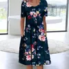 Casual Dresses Women Midi Dress Pockets Loose Hem Mid-Calf Längd blommig tryck A-line Holiday Daily Clothing