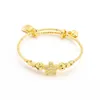 Jxx 24K bijoux en or vente chaude push and pull bijoux remplis d'or bracelets et bracelets femmes charme cloche bracelet avec perles