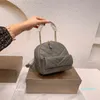 2023-Mini mochila clásica para mujer, bolso de hombro a rayas de cuero de sutura, marca de diseñador de lujo, bandolera, monederos Vintage para mujer