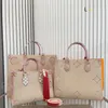 Klasik Çanta onthego çantası Kabartma Çiçek Bez Çantalar Omuz Crossbody Çanta Debriyaj Hakiki Deri Büyük Kapasiteli Kadın Mektubu çiçek Onthego tote çanta