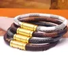 8 estilo Europa América Brazalete de acero inoxidable Marca Hombres Mujeres Parejas Cuero Hebilla magnética A cuadros Grabado Letra Metal PU Pulsera 17 CM