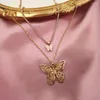Naszyjniki wisiorek płaski Złoty pusty naszyjnik motylowy dla kobiet wielowarstwowy łańcuch obojczyka z noryzacją dla zwierząt biżuteria boho biżuteria