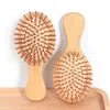 Brosses à cheveux en bambou Coussin d'air Peigne Paddle Démêlant Brosse à cheveux en bois Mini taille de voyage Massage cuir chevelu pour femmes hommes tous les cheveux bouclés cheveux secs et humides