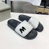 Designer kvinnor tofflor päls glider polära fleece lägenheter skor gummisula skrapor broderade bokstäver mjuk bild fast färg flip flops