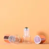 Botellas de rodillos de 1-5 ml para aceites esenciales Rollo de vidrio transparente en vial con bola de metal y tapa de rosa dorada Fpobe
