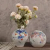 Wazony nowoczesne proste zwinięte ceramiczne ceramiczne wazon domowy pokój ornament kreatywny płyt owocowy