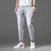 Jeans masculino designer de alta qualidade jeans masculino primavera 2022 nova tendência de moda simples versátil elástico ajuste fino calças retas de perna pequena HOSR