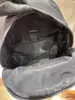 2V066A nouveau sac à dos pour hommes et femmes matériau en cuir de qualité haut de gamme et tissu en nylon bandoulière en nylon réglable léger et élégant