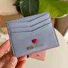 Designer de moda Bolsa feminina de couro cor sólida Bolsa curta Love change Caixa original feminina Porta-cartões de couro Bolsa de cartão de mão