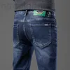 Jeans masculino designer FF europeu de alta qualidade jeans masculino casual pés finos bordados elásticos outono e inverno novas calças cortadas azul escuro GKST