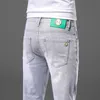 Jeans masculino designer de alta qualidade jeans masculino primavera 2022 nova tendência de moda simples versátil elástico ajuste fino calças retas de perna pequena HOSR