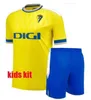 23 24 25 Cadiz Soccer Courseys Cadiz CF 2023 2024 Lozano Alex Bodiger Juan Cala Camiseta Ascenso A Liga Santander de Carnaval Men Kids Home Owd 3rd Football Shirts