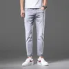 Jeans masculino designer de alta qualidade jeans masculino primavera 2022 nova tendência de moda simples versátil elástico ajuste fino calças retas de perna pequena HOSR