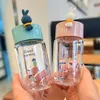 Wasserflaschen Mini-Glasbecher Tragbare süße Studentenflasche mit Deckelband umgekehrter wasserdichter bedruckter Milchkaffee