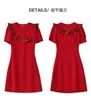 2023 Lato czerwona stała kolorowa sukienka z krótkim rękawem okrągła szyjka Długość sukienki W3L049702