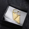 pujia逆三角形のpujia倒立三角形のpレター付きの新しい高品質の高品質メッシュレッドメンズ女性とイヤリング
