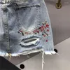 Skirts Women's Summer Hole Embroidered Mini Denim Skirt Single Breasted High Waist Wrapped Hip Anti Stray Light A Line Short