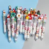 Stylos 20pcs / lot mignon Noël Santa Claus 10 couleurs Ballpoint stylo kawaii rétractable rollerball stylo cadeau scolaire de bureau