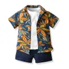 Ny produkt barns sommar kortärmad tröja slips blommor skjorta pojkar shorts tre stycken set heta sats barnkläder 2023